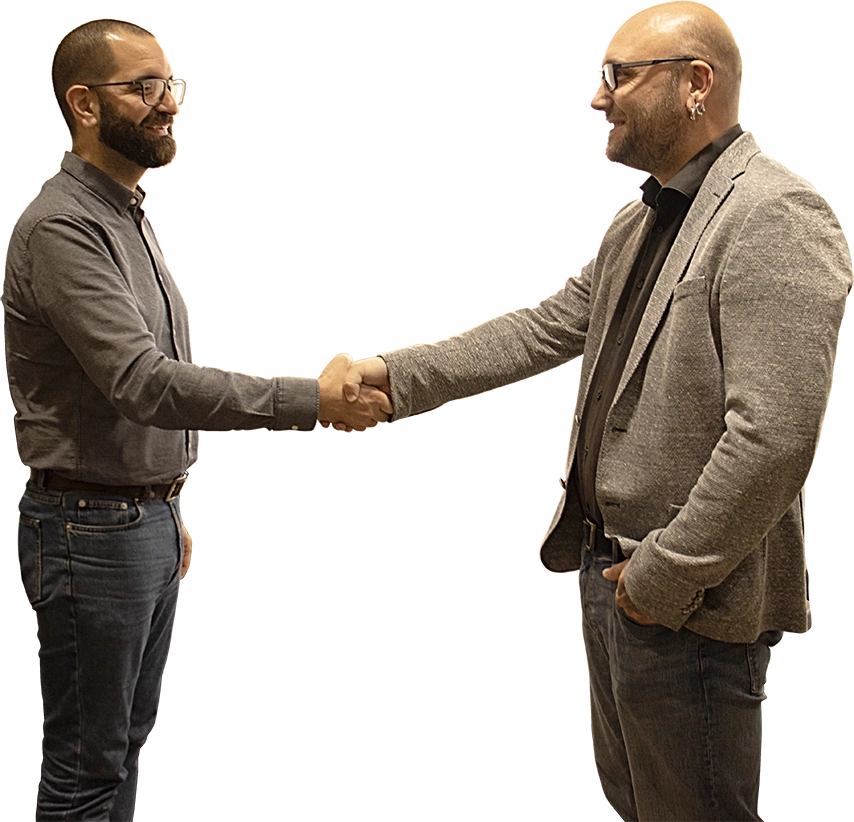 Two professionals shaking hands in a business agreement
