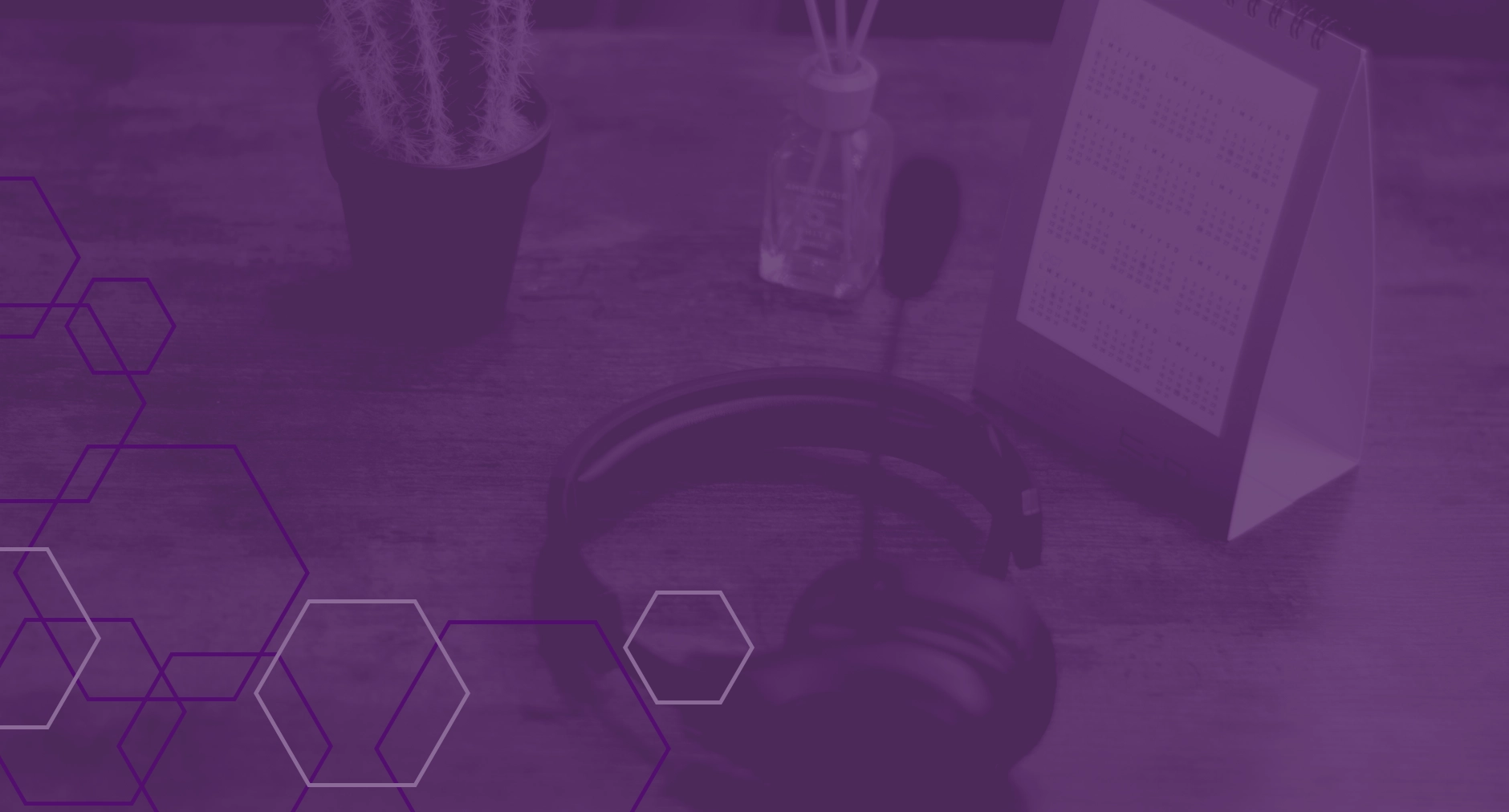 Headset and calendar on a wooden desk with a purple overlay and hexagonal design