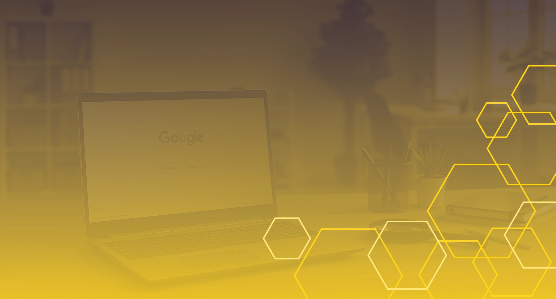 Laptop on desk with Google homepage, overlaid with yellow hexagonal pattern