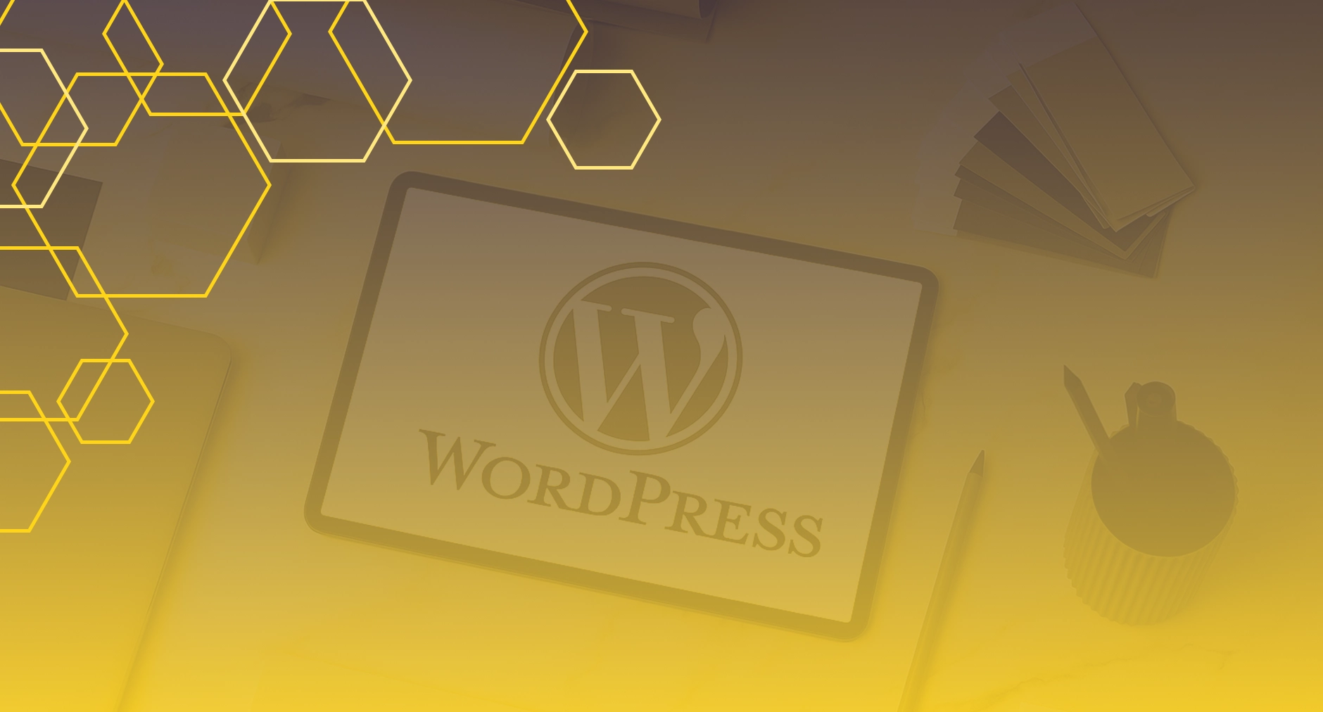 Tablet displaying the WordPress logo on a desk